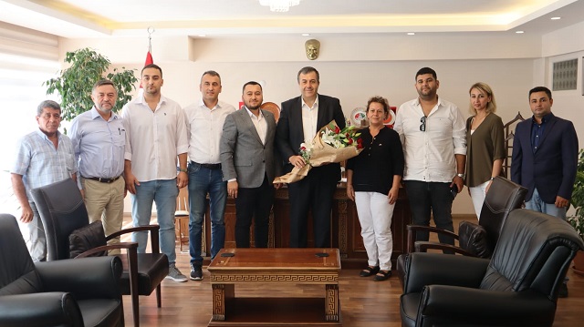 MHP DALAMAN İLÇE BAŞKANLIĞI İLK RESMİ ZİYARETİNİ  KAYMAKAM YAKUTA’YA YAPTI